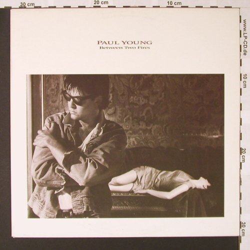 Young,Paul: Between Two Fires, CBS(450150 1), NL, 1986 - LP - E7252 - 7,50 Euro